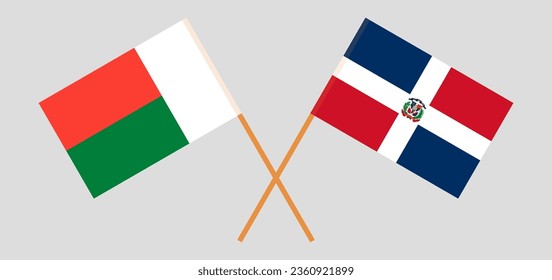 Crossed flags of Madagascar and Dominican Republic. Official colors. Correct proportion. Vector illustration
