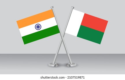 Crossed flags of Madagascar and India. Official colors. Correct proportion. Banner design