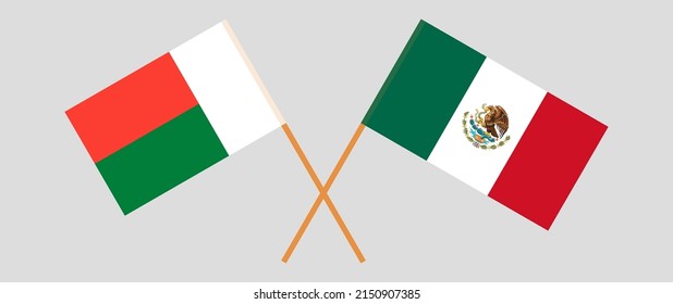 Crossed flags of Madagascar and Mexico. Official colors. Correct proportion. Vector illustration
