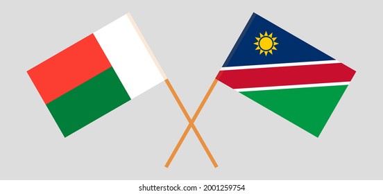 Crossed flags of Madagascar and Namibia. Official colors. Correct proportion