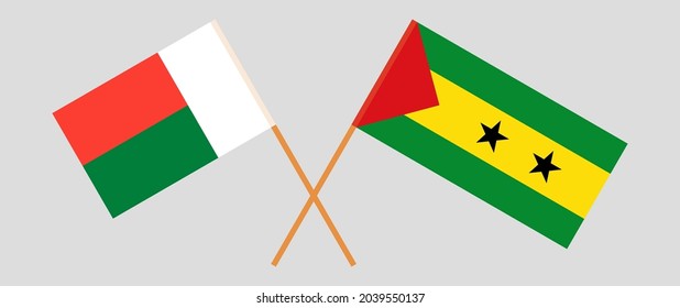 Crossed flags of Madagascar and Sao Tome and Principe. Official colors. Correct proportion
