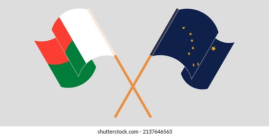 Crossed flags of Madagascar and the State of Alaska. Official colors. Correct proportion. Vector illustration
