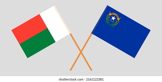 Crossed flags of Madagascar and The State of Nevada. Official colors. Correct proportion. Vector illustration
