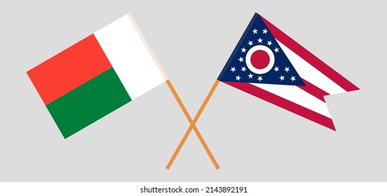 Crossed flags of Madagascar and the State of Ohio. Official colors. Correct proportion. Vector illustration
