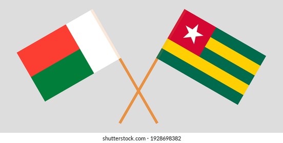 Crossed flags of Madagascar and Togo. Official colors. Correct proportion