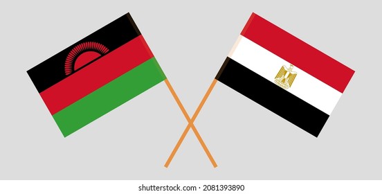 Crossed flags of Malawi and Egypt. Official colors. Correct proportion. Vector illustration
