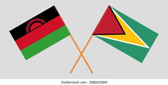 Crossed flags of Malawi and Gabon. Official colors. Correct proportion