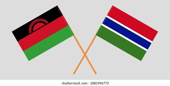 Crossed flags of Malawi and the Gambia. Official colors. Correct proportion