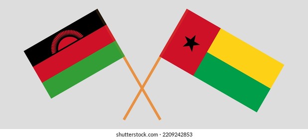 Crossed flags of Malawi and Guinea-Bissau. Official colors. Correct proportion. Vector illustration
