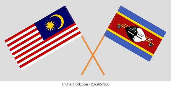 Crossed flags of Malaysia and Eswatini. Official colors. Correct proportion. Vector illustration
