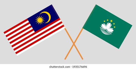 Banderas cruzadas de Malasia y Macao. Colores oficiales. Proporción correcta