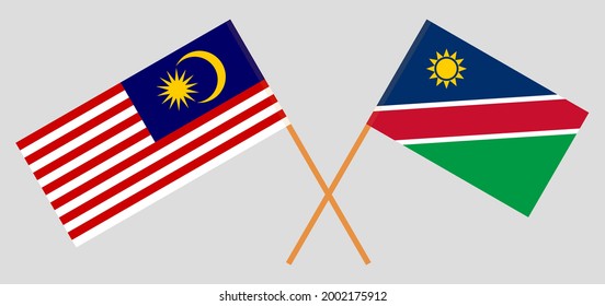 Banderas cruzadas de Malasia y Namibia. Colores oficiales. Proporción correcta
