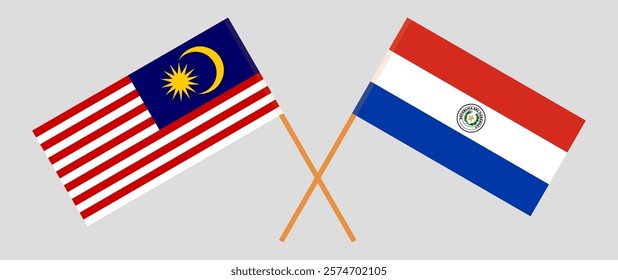 Crossed flags of Malaysia and Republic of Paraguay. Official colors. Correct proportion. Vector illustration.
