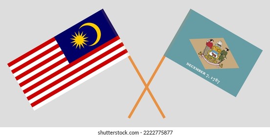 Crossed flags of Malaysia and The State of Delaware. Official colors. Correct proportion. Vector illustration
