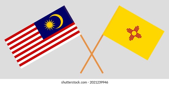 Crossed flags of Malaysia and the State of New Mexico. Official colors. Correct proportion