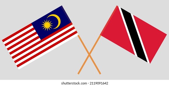 Crossed flags of Malaysia and Trinidad and Tobago. Official colors. Correct proportion. Vector illustration
