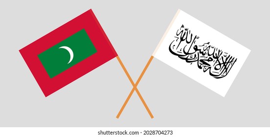 Crossed flags of Maldives and Islamic Emirate of Afghanistan. Official colors. Correct proportion