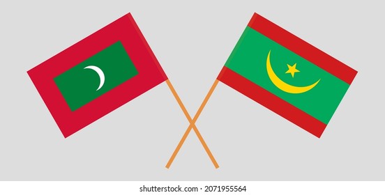 Crossed flags of Maldives and Mauritania. Official colors. Correct proportion
