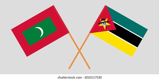 Crossed flags of Maldives and Mozambique. Official colors. Correct proportion
