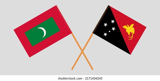 Crossed flags of Maldives and Papua New Guinea. Official colors. Correct proportion. Vector illustration
