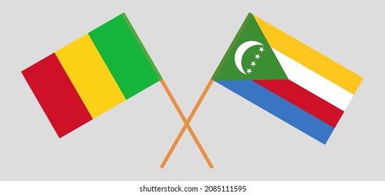 Crossed flags of Mali and the Comoros. Official colors. Correct proportion. Vector illustration
