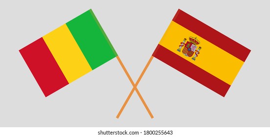 Crossed flags of Mali and Spain