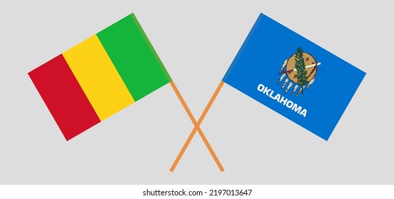 Crossed flags of Mali and The State of Oklahoma. Official colors. Correct proportion. Vector illustration
