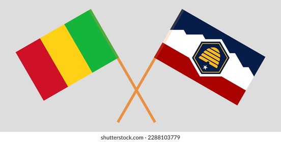 Gekreuzte Flaggen von Mali und dem Staat Utah. Offizielle Farben. Richtiger Anteil. Vektorgrafik
