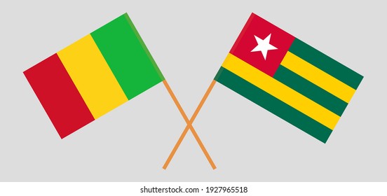 Crossed flags of Mali and Togo. Official colors. Correct proportion