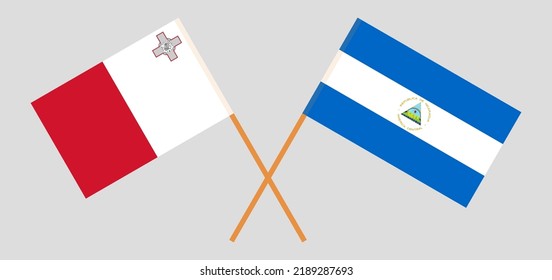 Crossed flags of Malta and Nicaragua. Official colors. Correct proportion. Vector illustration
