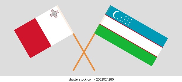 Crossed flags of Malta and Uzbekistan. Official colors. Correct proportion