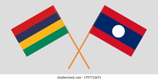 Crossed flags of Mauritius and Laos. Official colors. Correct proportion. Vector illustration
