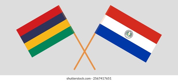 Crossed flags of Mauritius and Republic of Paraguay. Official colors. Correct proportion. Vector illustration.
