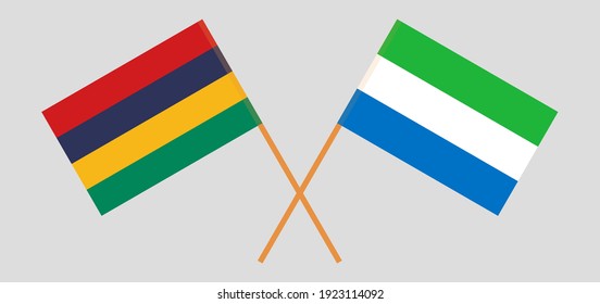 Crossed flags of Mauritius and Sierra Leone. Official colors. Correct proportion