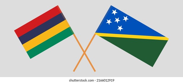 Crossed flags of Mauritius and Solomon Islands. Official colors. Correct proportion. Vector illustration
