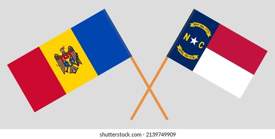 Crossed flags of Moldova and The State of North Carolina. Official colors. Correct proportion