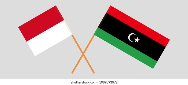 Crossed flags of Monaco and Libya. Official colors. Correct proportion