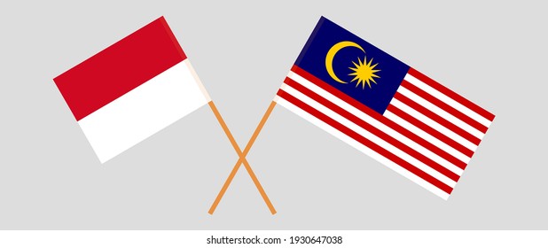 Crossed flags of Monaco and Malaysia. Official colors. Correct proportion