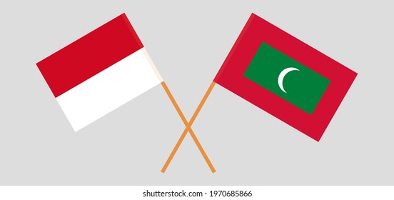 Crossed flags of Monaco and Maldives. Official colors. Correct proportion