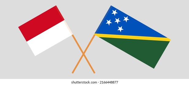 Crossed flags of Monaco and Solomon Islands. Official colors. Correct proportion. Vector illustration
