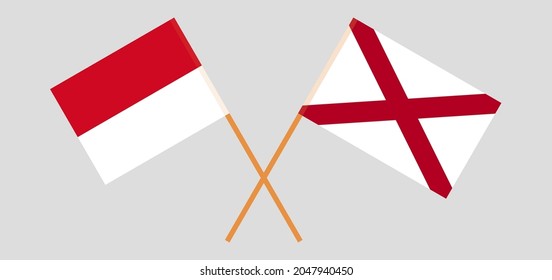 Crossed flags of Monaco and The State of Alabama. Official colors. Correct proportion