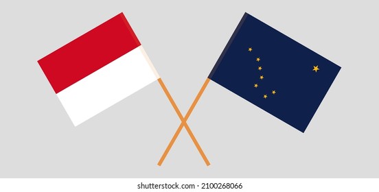 Crossed flags of Monaco and the State of Alaska. Official colors. Correct proportion. Vector illustration
