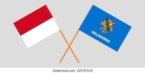 Überquerte Flaggen von Monaco und dem Staat Oklahoma. Offizielle Farben. Richtiger Anteil. Vektorgrafik
