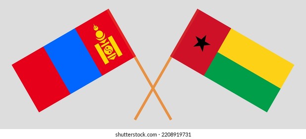 Crossed flags of Mongolia and Guinea-Bissau. Official colors. Correct proportion. Vector illustration
