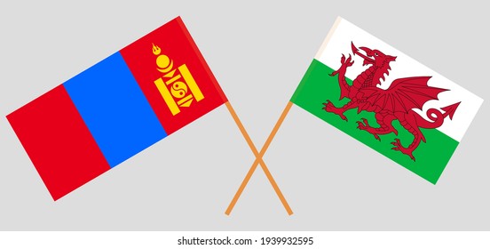 Crossed flags of Mongolia and Wales. Official colors. Correct proportion