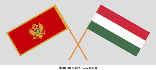 Crossed flags of Montenegro and Hungary. Official colors. Correct proportion