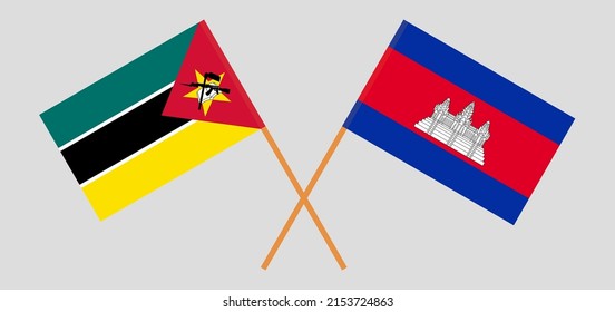 Crossed flags of Mozambique and Cambodia. Official colors. Correct proportion