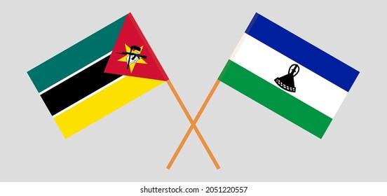 Crossed flags of Mozambique and Kingdom of Lesotho. Official colors. Correct proportion