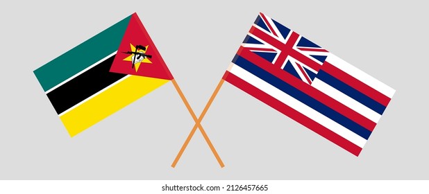 Crossed flags of Mozambique and The State Of Hawaii. Official colors. Correct proportion. Vector illustration
