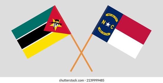 Crossed flags of Mozambique and The State of North Carolina. Official colors. Correct proportion. Vector illustration
